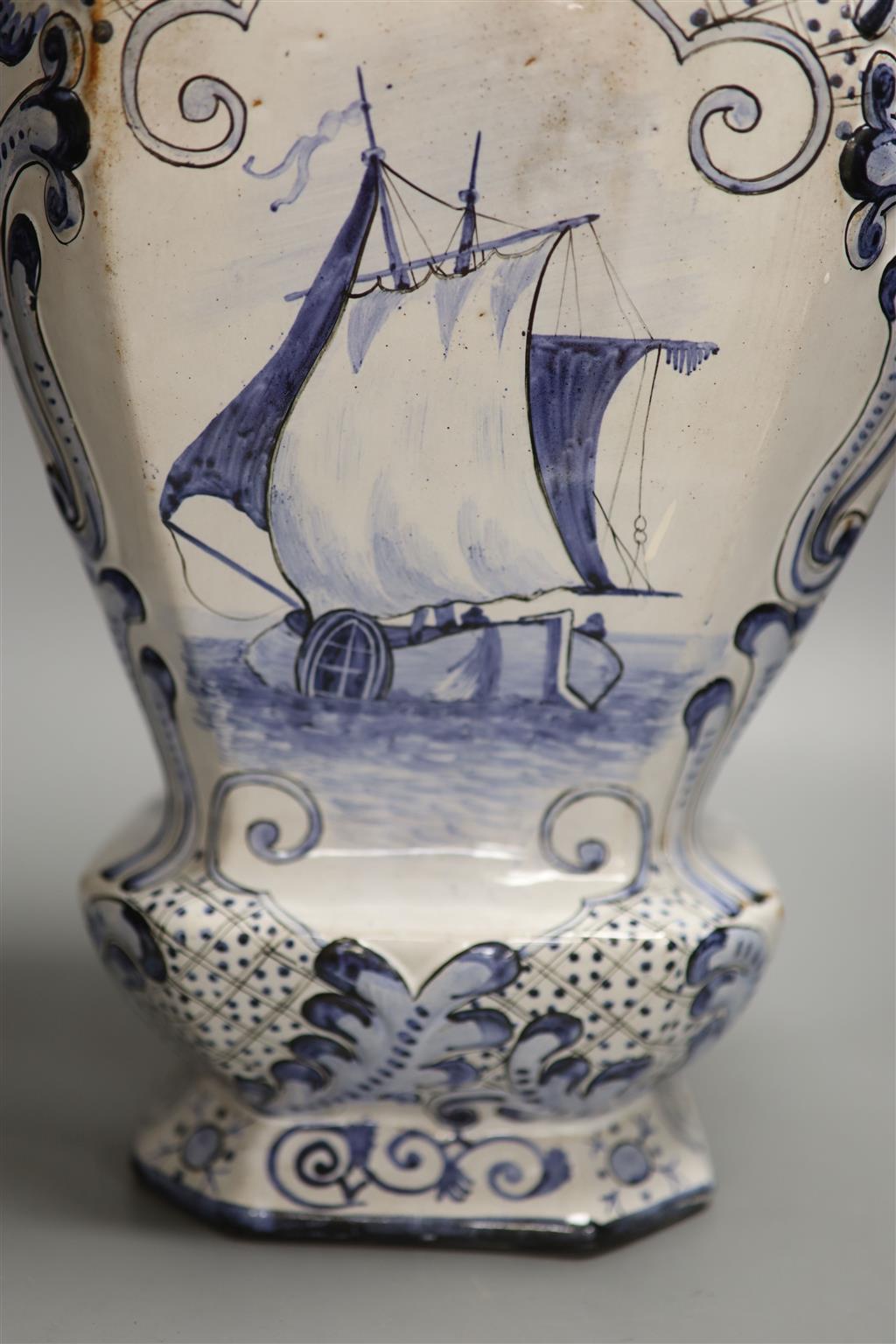 A large Delft vase and cover, height 60cm